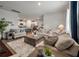 The spacious living room flows into the dining and kitchen areas, creating an open and inviting space at 9781 Roseberry St, Ladson, SC 29456
