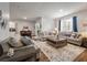 The open-concept living spaces with the dining and kitchen areas visible for seamless entertaining and everyday living at 9781 Roseberry St, Ladson, SC 29456