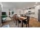 An open-concept home with the dining area and kitchen visible from the living room for easy entertaining at 9781 Roseberry St, Ladson, SC 29456