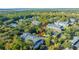 Overhead angle of a multi-story building surrounded by beautiful landscaping and mature trees at 1025 Riverland Woods Pl # 1108, Charleston, SC 29412