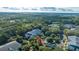 Aerial view of the community and building with mature landscaping and trees at 1025 Riverland Woods Pl # 1108, Charleston, SC 29412