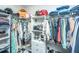 Walk-in closet with custom shelving and ample hanging space for optimal organization at 1025 Riverland Woods Pl # 1108, Charleston, SC 29412