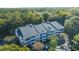 A multi-story building with balconies and mature trees at 1025 Riverland Woods Pl # 1108, Charleston, SC 29412