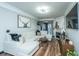 Inviting living room featuring a fireplace, modern decor, and hardwood flooring at 1025 Riverland Woods Pl # 1108, Charleston, SC 29412