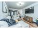 Cozy living room with a fireplace, hardwood floors, and natural light at 1025 Riverland Woods Pl # 1108, Charleston, SC 29412