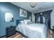 Serene main bedroom featuring a cozy bed, stylish accents, and private balcony access at 1025 Riverland Woods Pl # 1108, Charleston, SC 29412