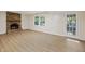 Large basement featuring luxury vinyl plank flooring and a brick fireplace at 104 Huntington Cir, Summerville, SC 29485