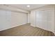 Neutral bedroom featuring vinyl floor and a closet with bi-fold doors at 104 Huntington Cir, Summerville, SC 29485