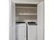 Laundry closet with full sized washer and dryer, and shelves at 104 Huntington Cir, Summerville, SC 29485