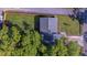 Bird's-eye view of house with large backyard, lush greenery, and a driveway at 1049 Bradford Ave, Charleston, SC 29412