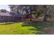Spacious backyard features a large deck and a new wooden fence at 1049 Bradford Ave, Charleston, SC 29412