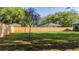 Backyard featuring a well-maintained lawn and a tall privacy fence, ideal for outdoor activities at 1049 Bradford Ave, Charleston, SC 29412