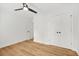 This bright bedroom is styled with hardwood floors, ceiling fan, and double door closet at 1049 Bradford Ave, Charleston, SC 29412