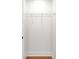 White, walk-in closet, featuring a metal rack for storage and a wooden floor at 1049 Bradford Ave, Charleston, SC 29412