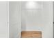Open closet featuring a metal rack for storage and a wood floor at 1049 Bradford Ave, Charleston, SC 29412
