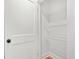 Neat walk-in closet with white wire shelving units to optimize storage space and organization at 1049 Bradford Ave, Charleston, SC 29412