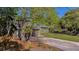 Lovely home with two car garage, healthy landscaping, and a long driveway at 1049 Bradford Ave, Charleston, SC 29412