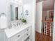 Bright bathroom featuring a marble vanity with a mirror and access to the upstairs bedroom at 105 Kirkhaven Ct, Goose Creek, SC 29445