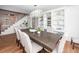 Bright dining room with hardwood floors, a chandelier, and white shelving at 105 Kirkhaven Ct, Goose Creek, SC 29445