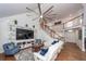 Open-concept living area with a vaulted ceiling, a staircase, and views of the entryway at 105 Kirkhaven Ct, Goose Creek, SC 29445