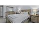 Cozy bedroom features a wooden bed frame, dresser, and a mirror for a relaxing space at 1104 Beresford Run, Charleston, SC 29492