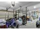 Spacious garage with multiple bays, ample storage, and a variety of equipment and recreational items at 1104 Beresford Run, Charleston, SC 29492