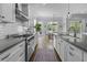 A bright kitchen features a breakfast area, lots of cabinet space, and modern appliances at 1104 Beresford Run, Charleston, SC 29492