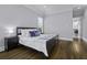 Neutral bedroom featuring hardwood floors, a ceiling fan, and natural light at 1104 Beresford Run, Charleston, SC 29492