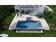 Contemporary pool and spa design featuring a built-in water feature, with sun loungers and outdoor dining space at 1104 Beresford Run, Charleston, SC 29492