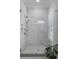 Elegant bathroom with marble shower featuring glass doors and dual shower heads at 1104 Beresford Run, Charleston, SC 29492