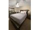 Bedroom with a large bed, mirror, dresser, and two nightstands at 1120 Seaside Ln, Charleston, SC 29412