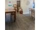 Versatile dining area showcasing wood-look floors and ample space for entertaining guests at 1120 Seaside Ln, Charleston, SC 29412