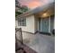 Inviting front door with blue shutters and a brick-lined walkway exudes charm at 1120 Seaside Ln, Charleston, SC 29412