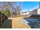 Spacious backyard featuring a patio, lawn, and wood fence offering privacy at 118 Willowbend Ln, Summerville, SC 29485