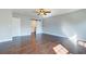 Bedroom with hardwood floors, ceiling fan, and sliding door to bathroom at 118 Willowbend Ln, Summerville, SC 29485