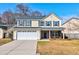 Attractive two-story home with a two-car garage, neatly landscaped lawn, and traditional design at 118 Willowbend Ln, Summerville, SC 29485