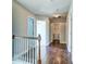 Upstairs hallway with hardwood flooring, and three rooms to choose from at 118 Willowbend Ln, Summerville, SC 29485