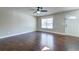 Bright living room features hardwood floors, white trim, and a white door at 118 Willowbend Ln, Summerville, SC 29485