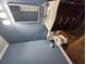 Cozy bathroom with blue walls, wood floors, and a vanity with a marble countertop and a modern toilet at 130 Delaney Cir, Summerville, SC 29485