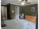 Bedroom featuring gray walls, a bed, rocking chair, ceiling fan, a window and a dresser at 130 Delaney Cir, Summerville, SC 29485
