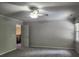 Spacious bedroom with neutral walls, a ceiling fan, and a window providing natural light at 130 Delaney Cir, Summerville, SC 29485