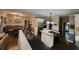 Open kitchen with stainless steel appliances, granite countertop, and kitchen island at 130 Delaney Cir, Summerville, SC 29485