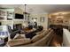Comfortable living room featuring a fireplace and view into the dining area at 130 Delaney Cir, Summerville, SC 29485