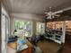 Bright home office featuring multiple windows and ceiling fan at 130 Delaney Cir, Summerville, SC 29485
