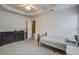 A bedroom featuring a tray ceiling with ceiling fan, black dresser, and single bed at 1341 Belle Grove Cir, Hanahan, SC 29410
