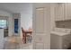 Adjacent laundry room and dining area with a washer in place at 1341 Belle Grove Cir, Hanahan, SC 29410