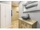 Modern bathroom features vanity, vessel sink, and tiled walk-in shower with storage niche at 14 Newark Ave, Goose Creek, SC 29445