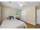 Comfortable bedroom features a ceiling fan, closet, and light-filled window at 14 Newark Ave, Goose Creek, SC 29445