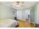 Light-filled bedroom with hardwood floors, closet, and ensuite access at 14 Newark Ave, Goose Creek, SC 29445
