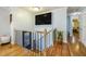 Hallway with hardwood floors with access to the rest of the home at 14 Newark Ave, Goose Creek, SC 29445